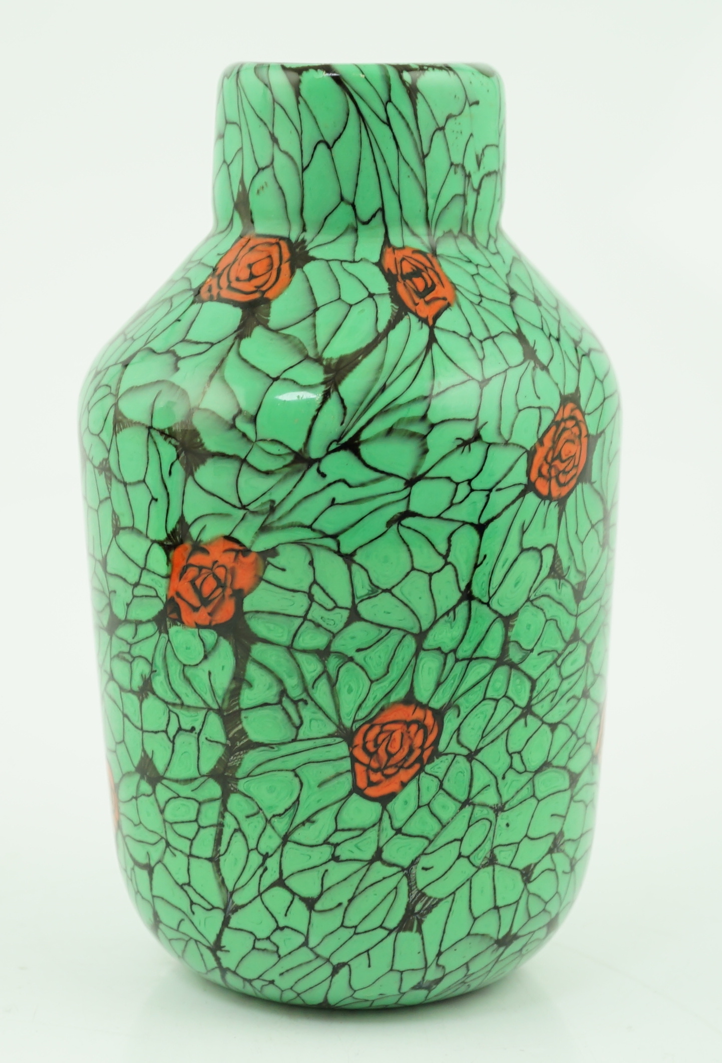 Vittorio Ferro (1932-2012) A Murano glass Murrine vase, with green leaves and red rose buds, signed, 19cms, Please note this lot attracts an additional import tax of 20% on the hammer price